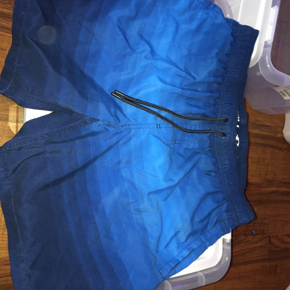 O’Neil mens, blue swim trunks.